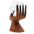 carved-hand-with-molten-glass-bowl